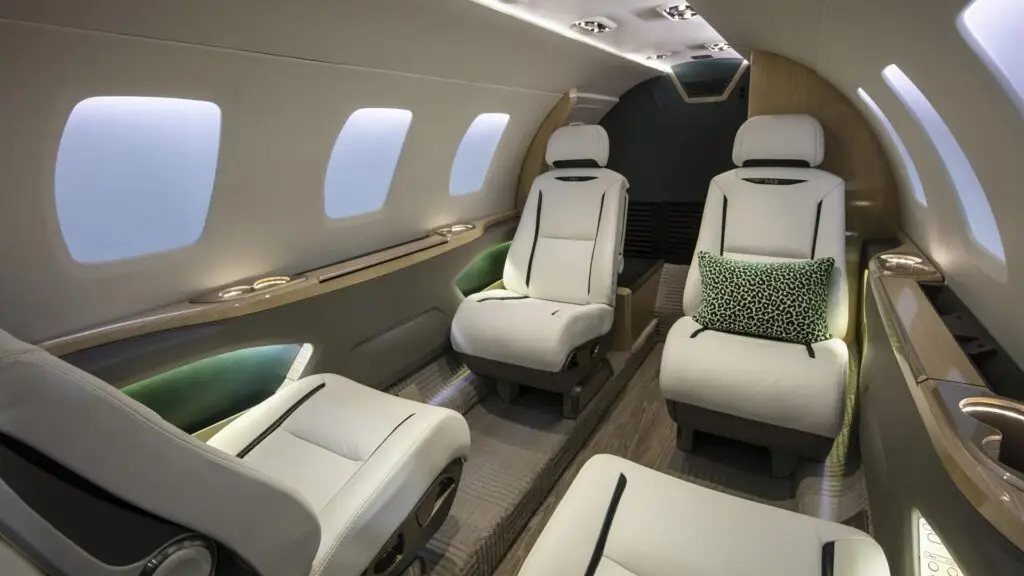 Luxurious private jet interior with plush seating