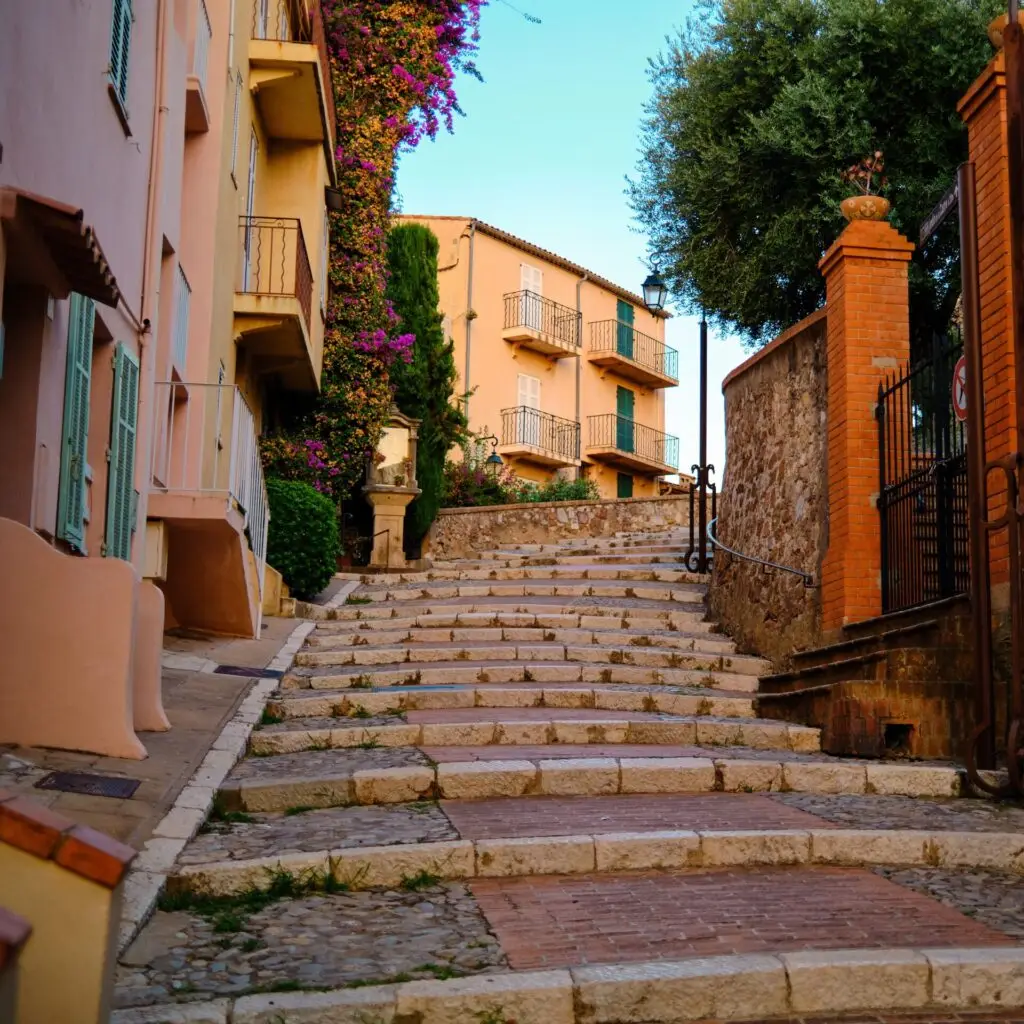 Stone steps between colorful buildings in quaint town